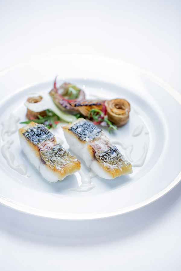 Restaurant Le Meurice Alain Ducasse 'ikejime' line caught sea bass on the scale%2C artichokes%2C rocket salad low res